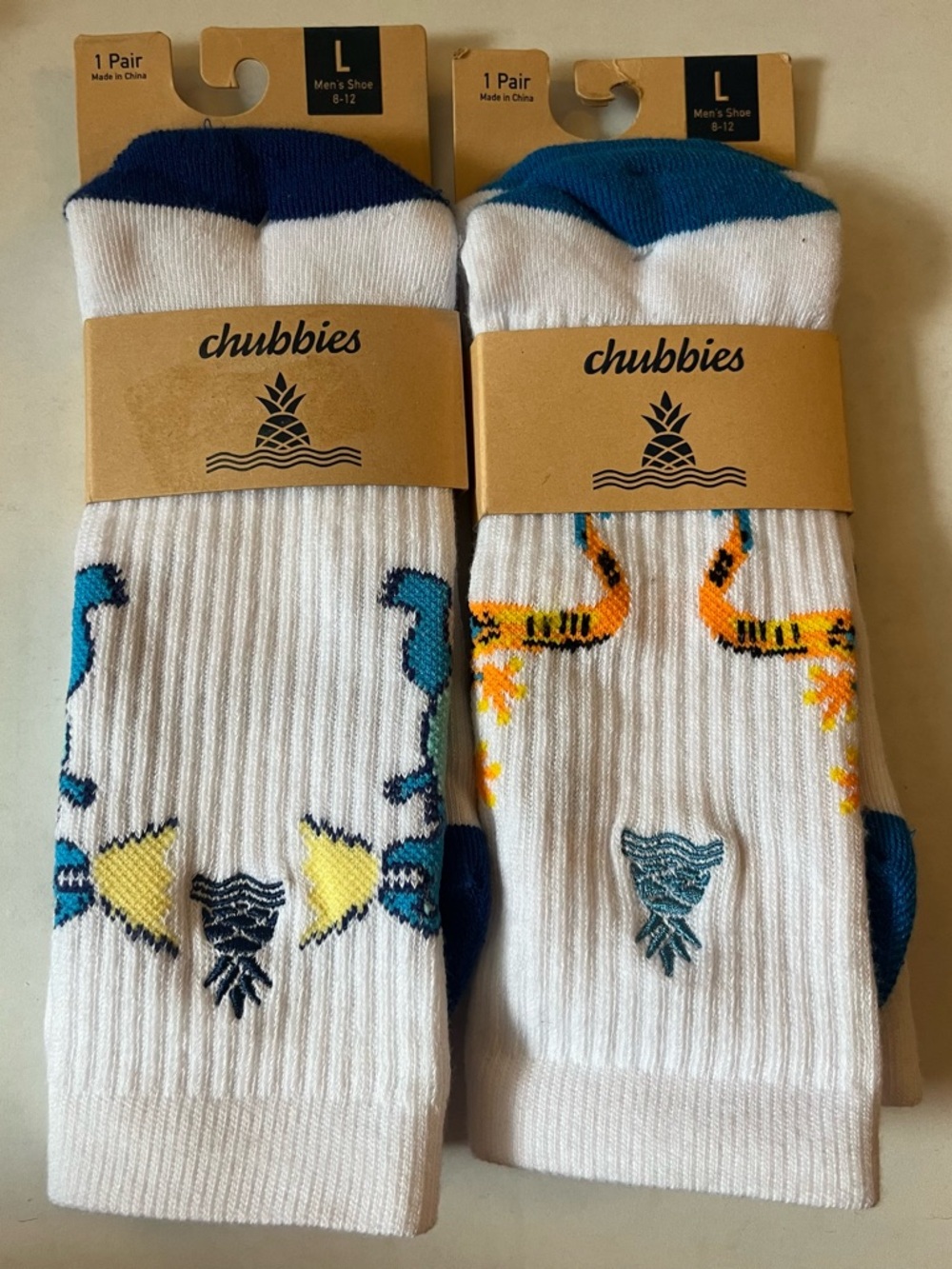 chubbies White Crew Socks with Blue, Yellow & Orange Motifs - 2 Pack